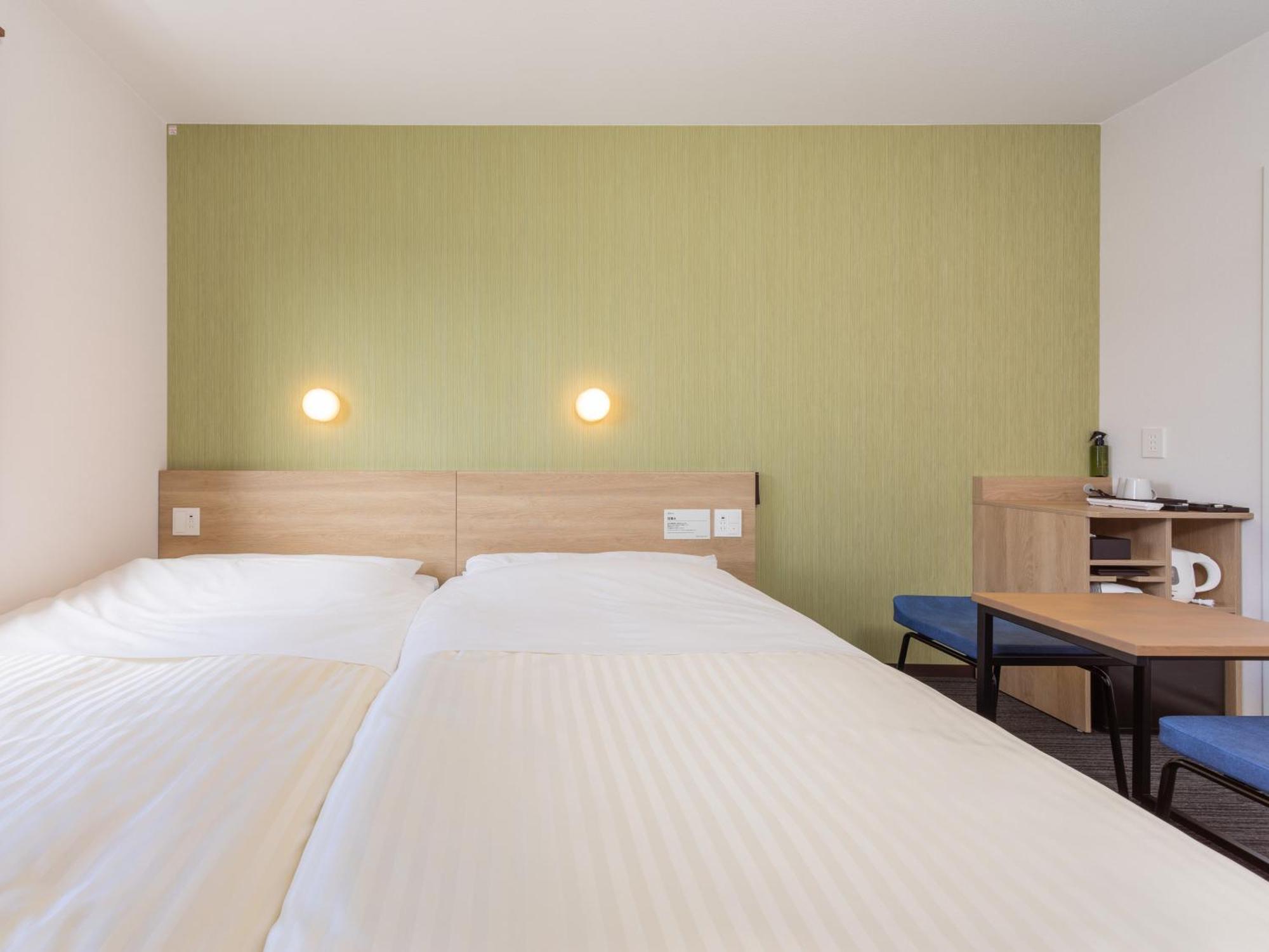 Super Hotel Yahaba Station East Exit Bagian luar foto